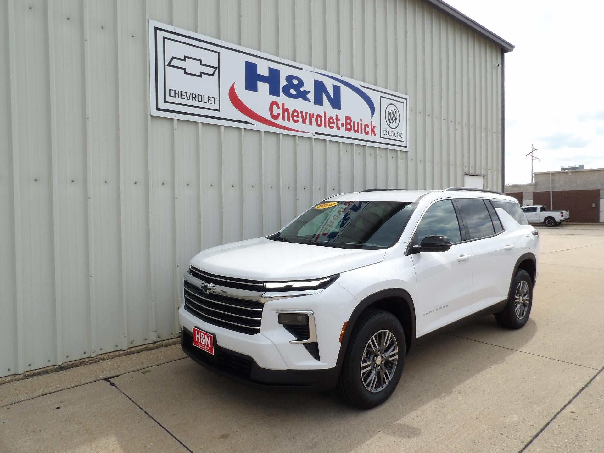 2026 Chevrolet Traverse LT in Summit White — front three-quarter view